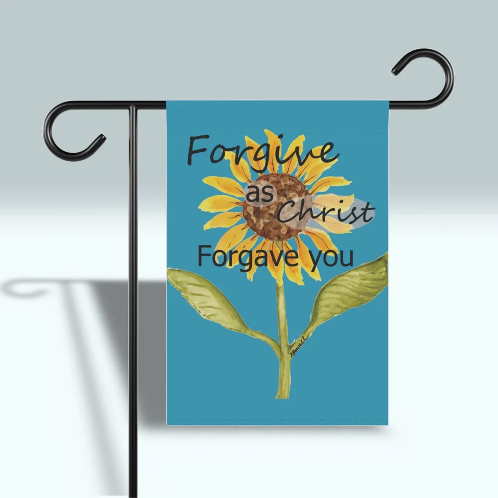 Forgive as Christ: Beautiful, Vibrant, Sunflower Flag shown front side on a flag holder so that you can see it's vibrant beautiful color contrast.