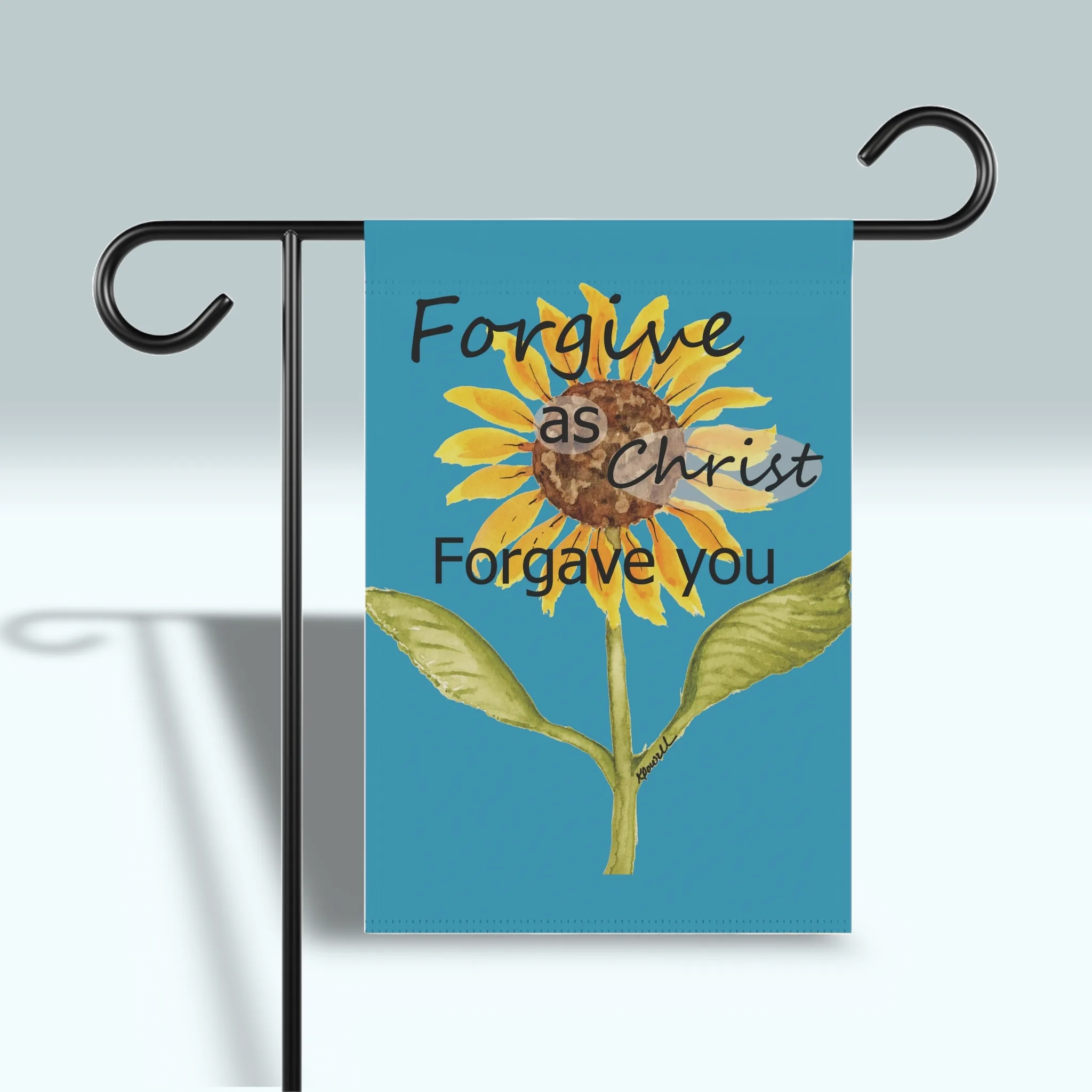 Forgive as Christ: Beautiful, Vibrant, Sunflower Flag shown front side on a flag holder so that you can see it's vibrant beautiful color contrast.