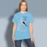 Beautiful Crane Tee Living the Fantastic God Life Sky colored Haloed Tee happy female customer wearing the tee shirt