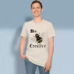Bee Creative Tee New Fantastic Wings of Invention Natural Colored Haloed Tee happy male customer wearing the tee shirt