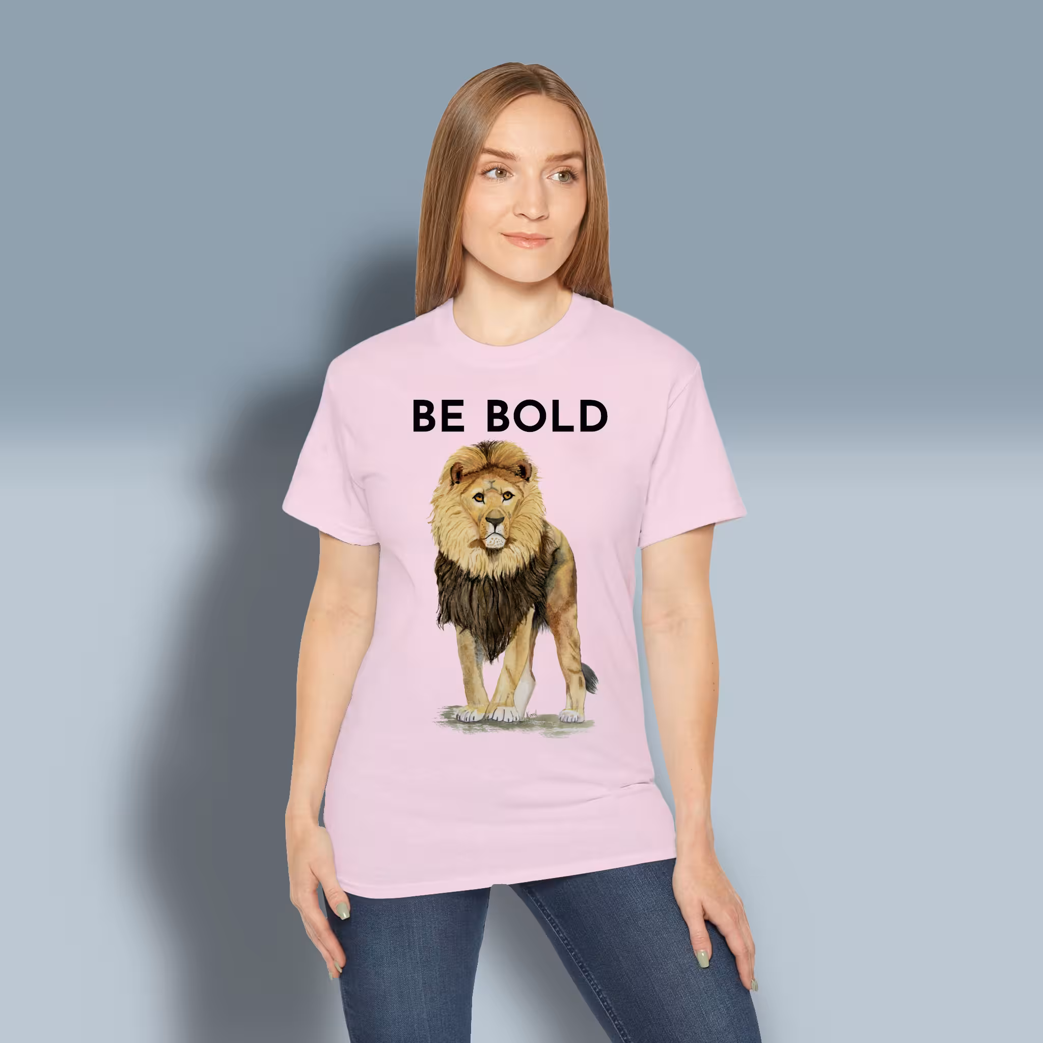 Bold Beautiful Lion Tee Daring, Fearless, Inspiration from Proverbs Light Pink Colored Haloed T-Shirt Happy Female Customer Wearing The Tee Shirt