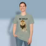 Bold Beautiful Lion Tee Daring, Fearless, Inspiration from Proverbs Sage Colored Haloed T-Shirt Happy Male Customer Wearing the Tee Shirt