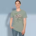 Forgiveness Blooms Tee that will make You Love God's Grace Sage Colored Haloed T-Shirt happy male customer wearing the tee shirt