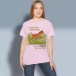 Free Spirit Foal Tee The Beautiful Gift of Freedom Light Pink Colored Haloed Tee happy female customer wearing the tee shirt