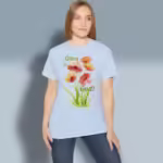 Glorious Poppies Tee Praising God in Beautiful Vibrant Colors Light Blue Colored Haloed Tee happy female customer wearing the tee shirt