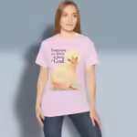 Hatched in Grace Tee Irresistibly Beautiful Baby Chick Light Pink Colored Haloed Tee happy female customer wearing the tee shirt