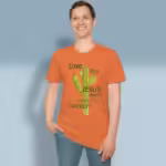 Love Like Jesus does even if it's prickly Heather Orange Colored Haloed Tee happy male customer wearing the tee shirt