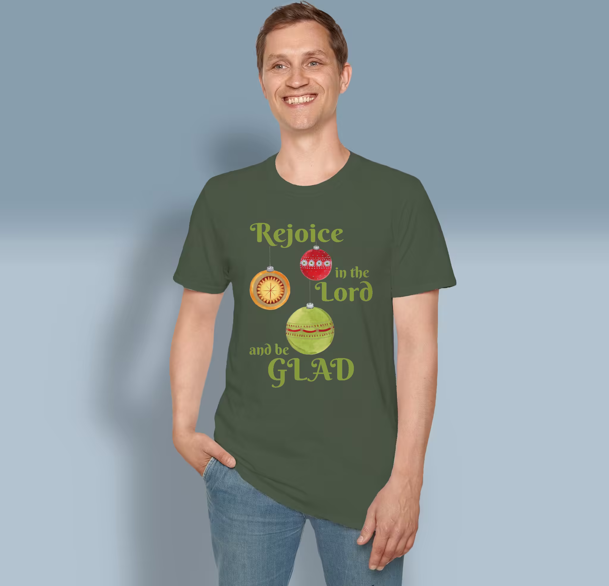 Festive Ornaments Tee Shining Stars & Holiday Cheer Forest Green Colored Haloed Tee Happy Male Customer Wearing the Tee